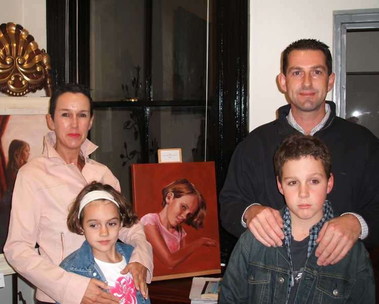Watts Family with painting of Lily